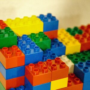 a stack of legos sitting on top of a table