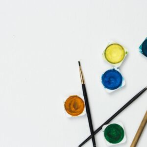 assorted-color paints and paint brushes